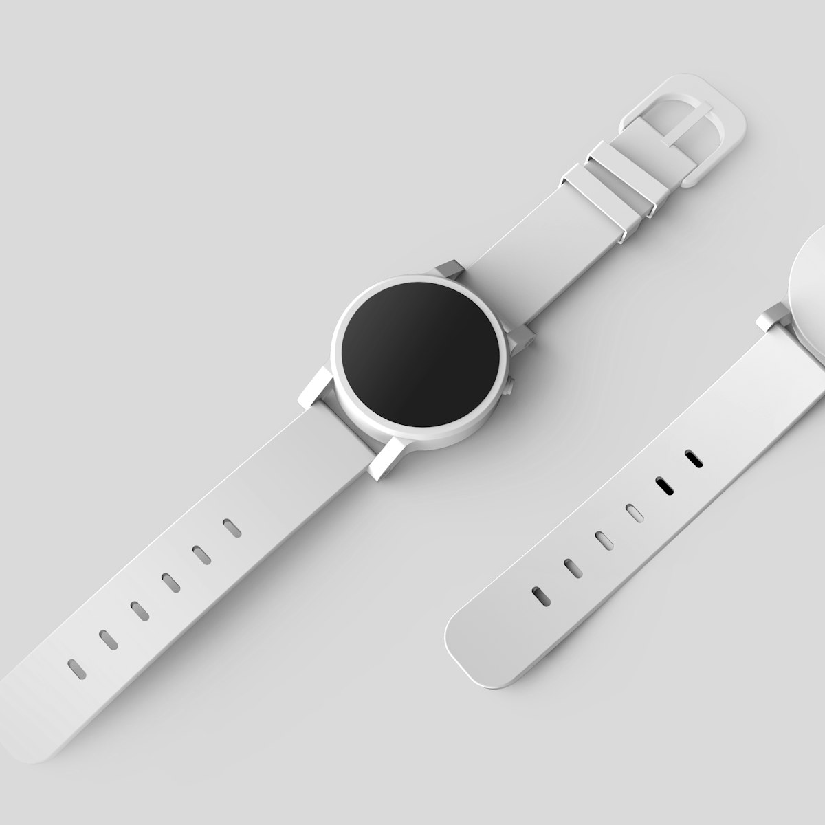 A white smartwatch photographed on a plain grey background.